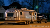 Our Airstream in the glow of night.